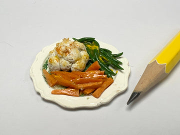 Vintage plate of cooked vegetables