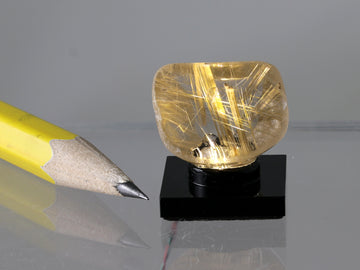 Golden rutile in quartz, lighted.  Please read note about the electrics!