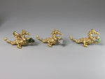 Three gold dragon figurines holding birthstones, dollshouse miniatures