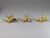 Three gold dragon figurines holding birthstones, dollshouse miniatures