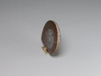 Side view, Ammonite fossil in polished slab for dollshouse