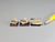 Three fossil jaws with teeth, dollhouse displays