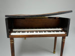 Orvin Fjare painted burl harpsichord.  Extra shipping/insurance may be required!