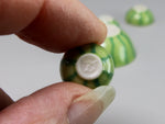 Avon Miniatures maker's mark