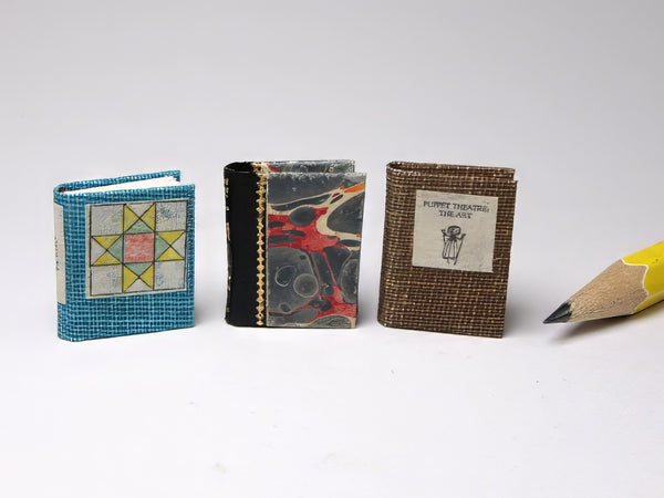 Quilts, High Water Mark & Puppet Theatre miniature books by Borrower's Press