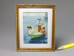 Framed miniature painting of children in a boat on water with a gold frame.