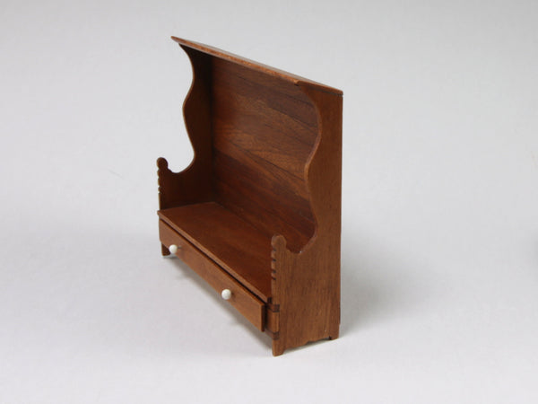 Side view, 1:24 hooded settle, working drawers, by Sue Hamlin.  Dollshouse miniature